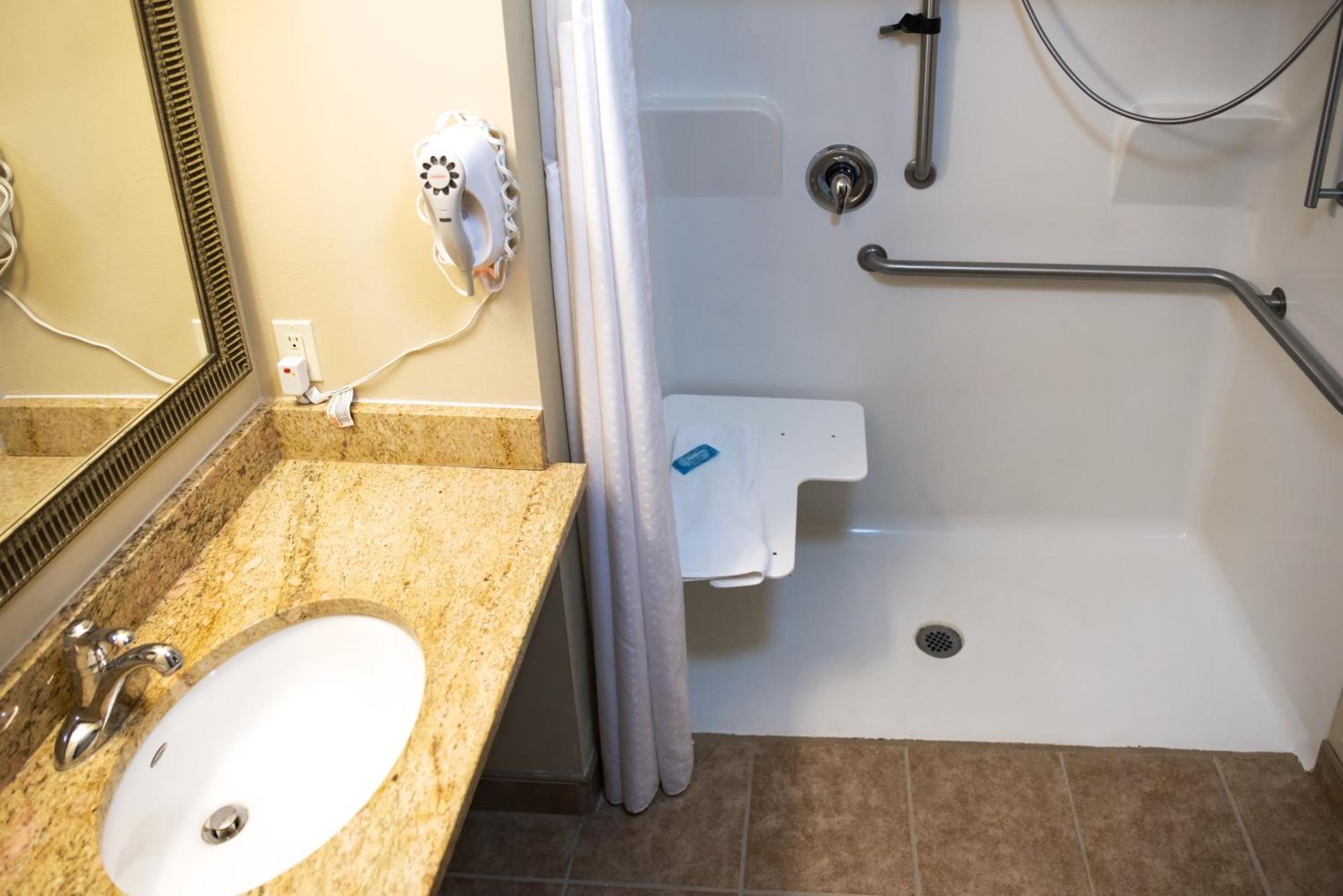 Queen Room with Two Queen Beds Hearing Accessible with Roll-In Shower - Non-Smoking